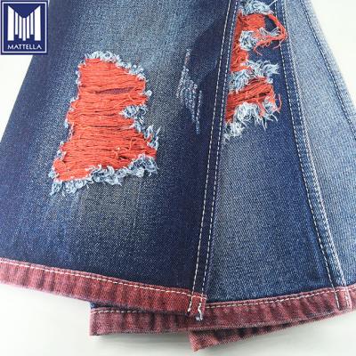 China K9881-3 Cotton Polyester Blend Red Color Bull Weft Chinese Vintage Distressed Denim Fabric Stock Lot Shrink-Resistant For Fashion Jeans for sale