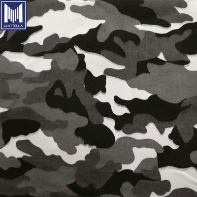 China Customized Disruptive Color Design Logo Pattern Shrink-Resistant Camouflage Printed Denim Fabric For Jeans Clothes for sale