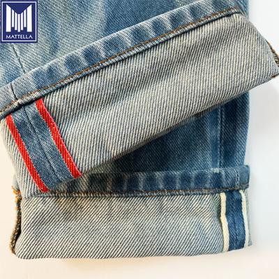 China Viable manufacturer of red and white line Japanese denim dyes for super slim fit with medium selvedge/high rise jeans for sale