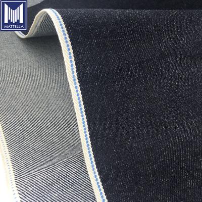 China Shrink-Resistant Cheap Rolls Grade Resistant Blue 15oz Race Selvadge Japanese Un-washed Style Raw Denim Fabric For Vintage Jeans for sale