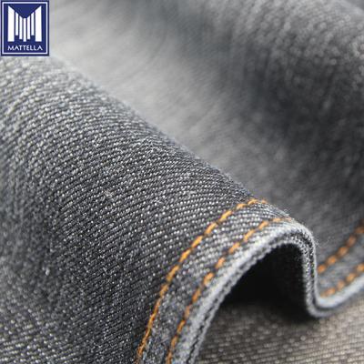 China Shrink-Resistant Before Black Indigo Color Non Wash 11oz Stretch Cotton Polyester Denim Fabric Rigid List Price In India Sri Lanka for sale