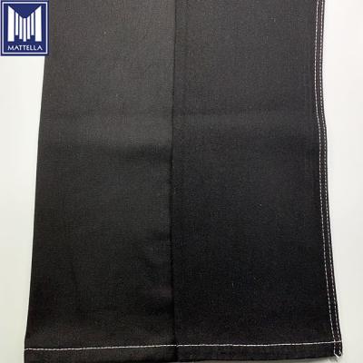 China Shrink-Resistant Cheap Wholesale Stock Price Black Warp Black Weft Waxed 75% Cotton 25% Polyester Blend Denim Fabric for sale