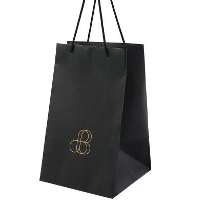 China Recyclable Custom Logo Foldable Paper Boutique Carrier Packaging Flower Shopping Bags for sale