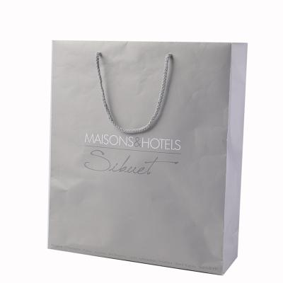 China Luxury Gray Shopping Art Paper Gift Bag Custom Size Recyclable For Jewelry Packaging for sale