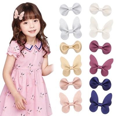 China Wholesale Hair Decoration Girls Hair Accessories Pink PU Candy Glitter Butterfly Bow Hair Clips For Kids Hairpin for sale