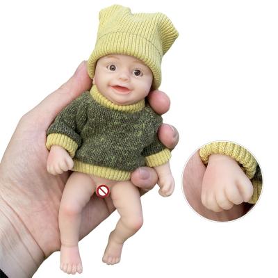 China Soft Toy 6 Inch Full Solid Silicone Bebe Reborn Doll Handmade Cute Smile Boys for sale