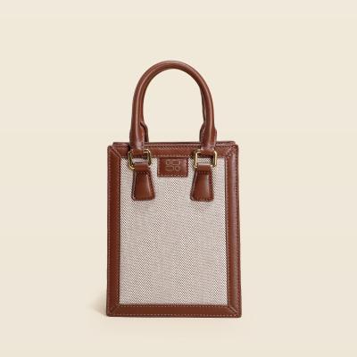 China Urban Simplicity High Quality Luxury Ladies Square Handbag Leather Vertical Messenger Bag for sale