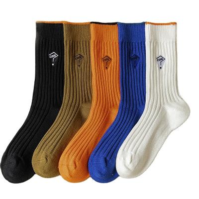 China QUICK DRY Newest hot selling men's adsorbent sweat knitting socks high quality thickened winter custom embroidery logo crew socks for sale