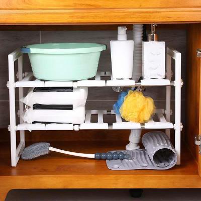 China Pinpinfamily 2 Tier Sink Storage Rack Viable Multifunctional Foldable Cabinet Plastic Kitchen Over Sink Dish Rack for sale