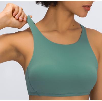 China 2021 Breathable Strappy Bralette Gym Tops High Back Padded Sports Pullover Beauty Yoga Bra Support for sale