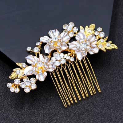 China Bridal Hair Accessories Luxury High Quality Bridal Hair Accessories Wedding Gold Alloy Hair Comb Metal Leaves Modern Bridal Headpiece for sale