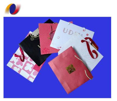 China Handmade Custom Apparel Custom Logo Print Shopping Paper Bag Shoe Packaging Gift Cheap Washable Paper Bag for sale