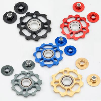 China 4mm; 5mm; 6mm Screw Holes TWOOC 11T Rotary Bike Guide Ceramic Wheel Guide Wheels for sale