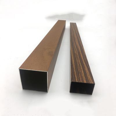 China Decorations powder wood grain square tube cladding aluminum profile for furniture decoration for sale