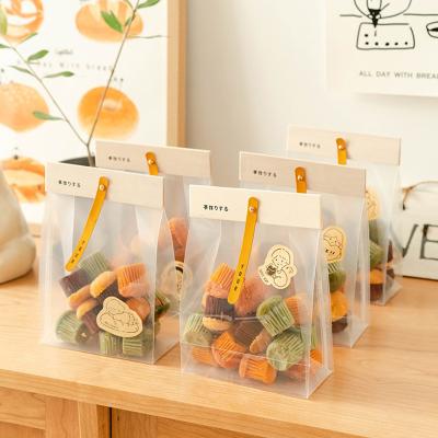 China Disposable Plastic Transparent Cookie Candy Packaging Bag With Wooden Chips Sealed for sale