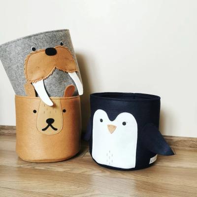 China Eco-friendly durable Nordic inspired felt toy storage, penguin basket, woodland room decor, marine life for sale