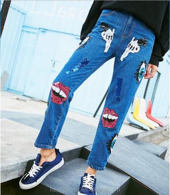 China Custom Made 100% Cotton Denim Pants Jeans Woman Anti-Pilling With Sequin Eyes Mouth Patches for sale