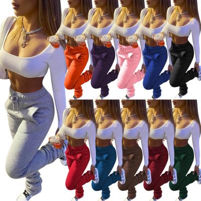 China Women's Breathable Sports Tracksuit Pile Solid Color Fashion Clothing Pants Trendy Women Pile Women's Casual Trousers for sale