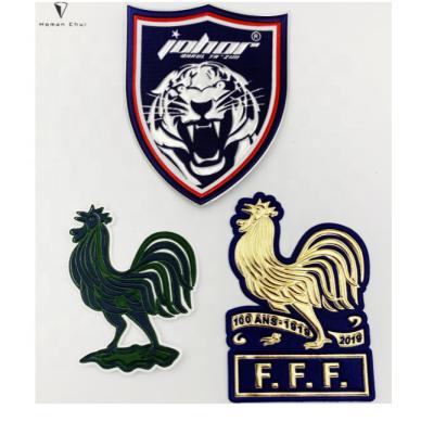 China PVC 3D Patches For Apparel China Factory Custom Design High Quality Custom Soft PVC 3D Desgin Printed Iron-on Backing 150 Degree for sale