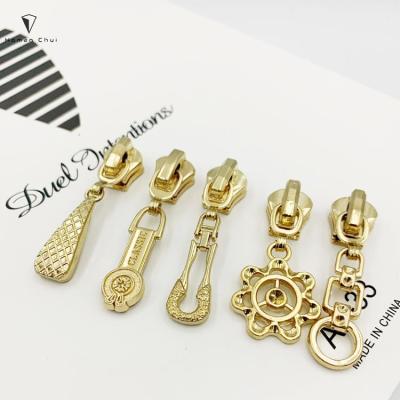 China Nickel Free Customized Brand Metal Logo Embossed Zipper Puller With Slider For Bags / Clothing for sale