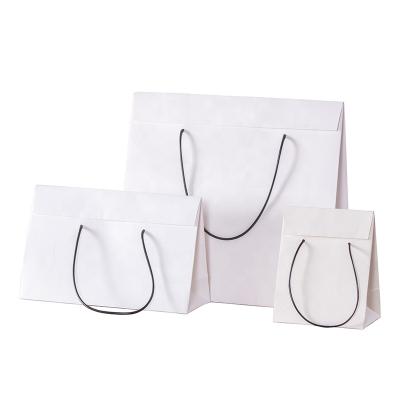 China Recyclable Bag Paper Printed Custom Logo Packaging Paper Bag Clothing Shopping Gift Jewelry for sale