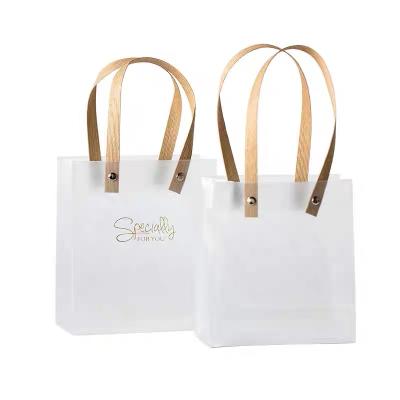 China Recyclable Reusable Custom Clear Transparent PVC Handle Bag Plastic Shopping Tote Bag for sale