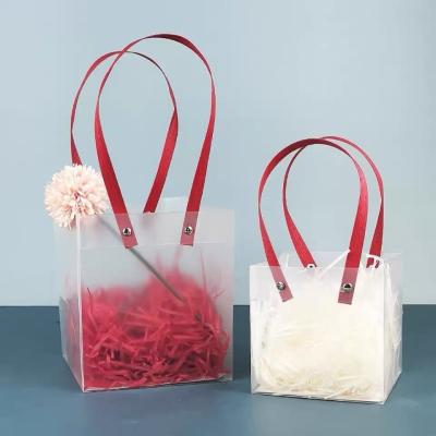 China Recyclable Wholesale Wedding Gift Transparent Plastic PP Handle Bag For Shopping for sale