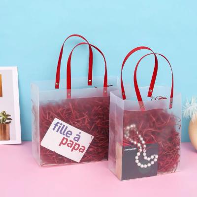 China Recyclable Custom Logo Printed Transparent PVC PP Cosmetic Gift Shopping Packaging Bag for sale