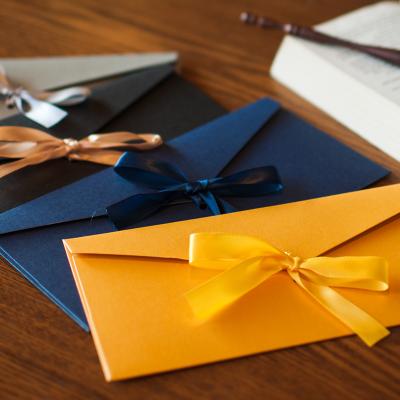 China Environmentally Friendly High Quality Custom Gold Foil Emboss Kraft Paper Announcement Invitation Paper Envelope With Ribbon Bow for sale