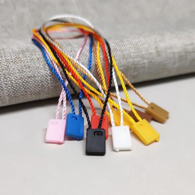 China Other Colored Lock Normal White Plastic Tag Seal Tag Swing Loop Seal String For Tags for sale