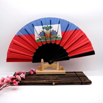 China Custom Printed Plastic Haiti Folk Art Hand Held Folding Fan for sale