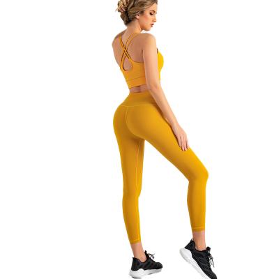 China Breathable Women's Seamless Yoga Set Gym Sports Wear Yoga SuitFitness Leggings Bra Yoga Set for sale