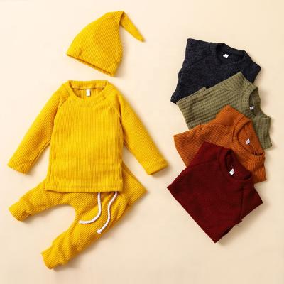 China Unisex Breathable Newborn Baby Clothes Long Solid Romper Spring Cap 3pcs Baby Outfit Clothes Set for sale