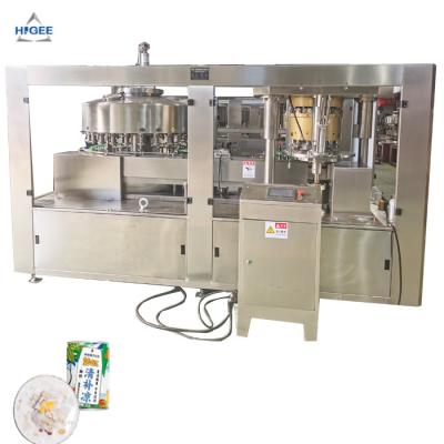 Cina Canned coconute milk juice filling seaming machine with cold glue labeling machine line in vendita