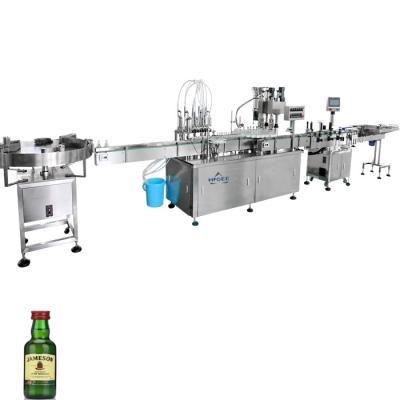 China 2000BPH 50ml small glass bottles filling capping labeling machine line for liquor gin spirits brandy vodka bottling à venda