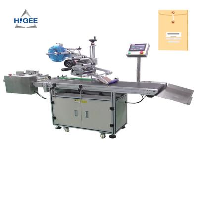 Cina Higee machinery sticker labeling machine for plastic bag paper bag alu bags labeling applicator in vendita