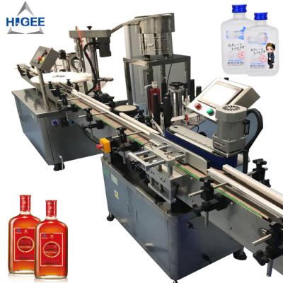 China Máquina de rellenar de la ginebra automática con el embotellado de cristal de las bebidas espirituosas de la ginebra del champán del whisky del sprite y el embotellamiento de la máquina que capsula en venta