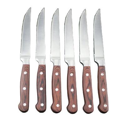 China Viable German Steel Fruit Knife Household Hotel Knives Western Style Serrated Steak Knife With Wood Handle for sale