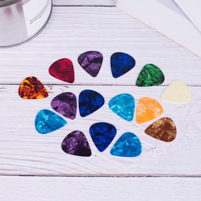 China Cheap Wholesale Professional Guitar Celluloid ABS Empty Guitar Picks Custom OEM for sale