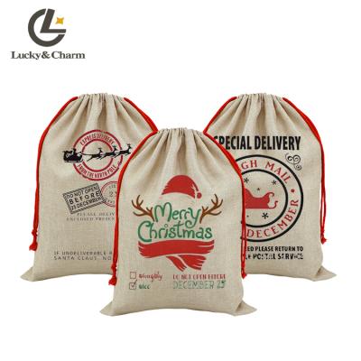 China Custom Drop Shipping Hot Product Custom Pattern Red Color Shopping Gifts Cotton Canvas Jute Santa Sack for sale