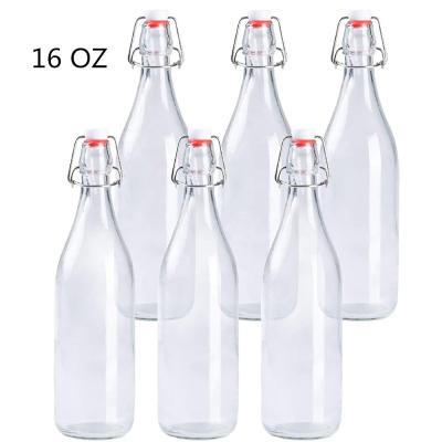 China Classic 17oz Freshness Retention Swing Top Glass Bottles With Stopper For Water Milk And Juice for sale