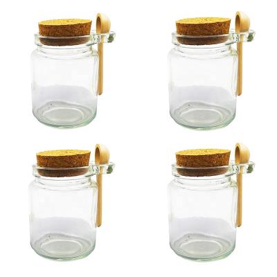 China Freshness Preservation 8oz Spice Bath Salt Glass Herbs Packaging Honey Jars Set 200ml Kitchen Canister With Cork Lid And Wooden Spoon for sale