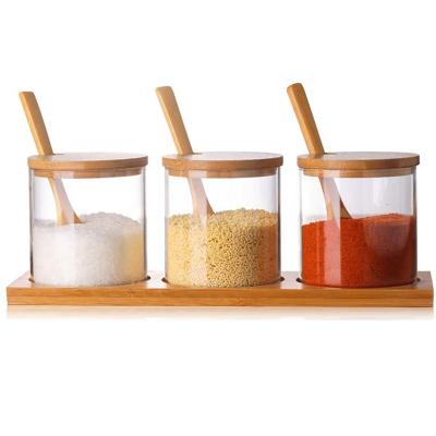 China Freshness Preservation OEM Spice Bath Salt Jars Glass Packaging Canister for Kitchen with Bamboo Lid and Wooden Spoon for sale