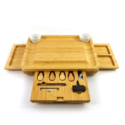 China Sustainable Unique Bamboo Cheese Board with Set of 4 Cutlery, Wooden Charcuterie Board Food Tray and Serving Tray Board for sale