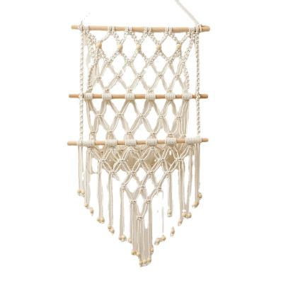 China Wholesale Minimalist Woven Tapestry Tassel Plant Storage Rack Macrame Magazine Rack for Books Mail Home Office Bedroom Home Decor for sale