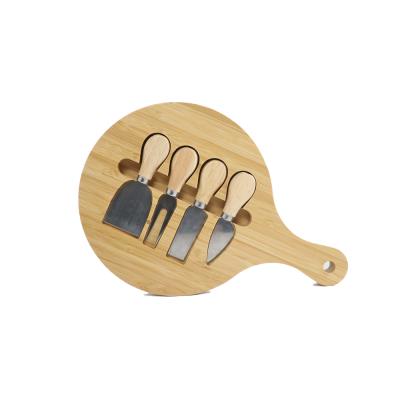 China Viable Promotional Unique Design Racket Shaped Round Cheese Bamboo Board With Handle Knife Set Gift Idea for sale