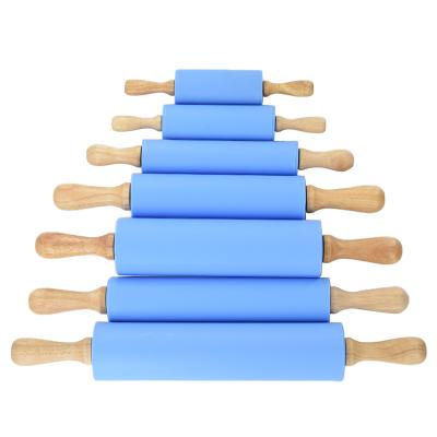 China Success Food Grade Silicone Rolling Pin With Stable Wood Handle for sale