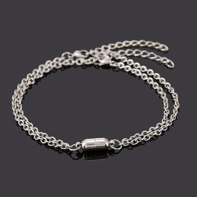 China 2021 New Fashion Jewelry Wholesale Magnet Attracts A Pair Of Stainless Steel Lovers Bracelet for sale