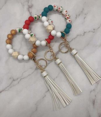 China Ethnic Color Silicone Bead Bracelet Beaded Tassel Customizable Leather Bracelet Key Chain for sale