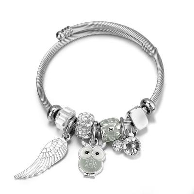 China Owl Stainless Steel Women Beaded Bracelet FASHION Angel Wing Pendant Jewelry for sale